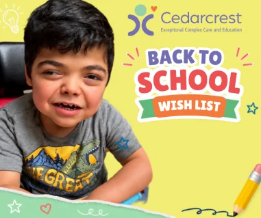 Smiling child in a wheelchair, Back to School Wish List sign, Cedarcrest logo, colorful background.